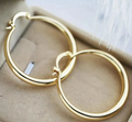 Large hoop earrings in gold