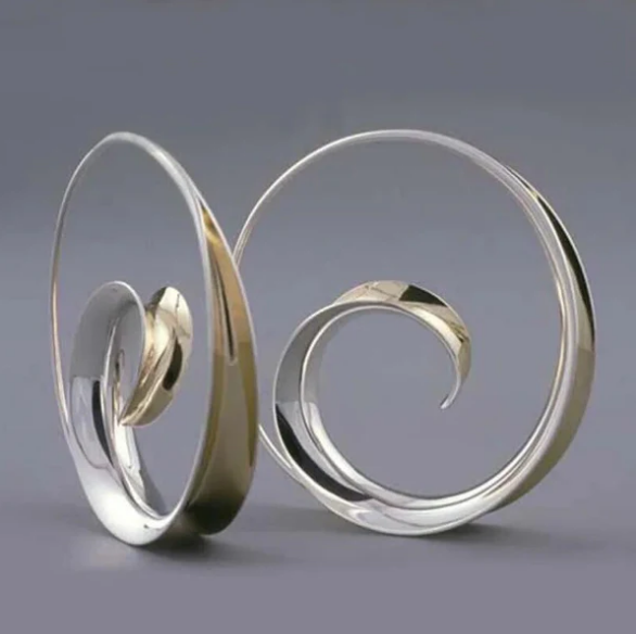 Vintage earrings with spiral waves