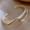 White opal elegant golden bracelet