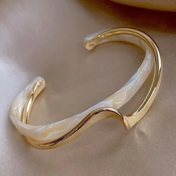 White opal elegant golden bracelet